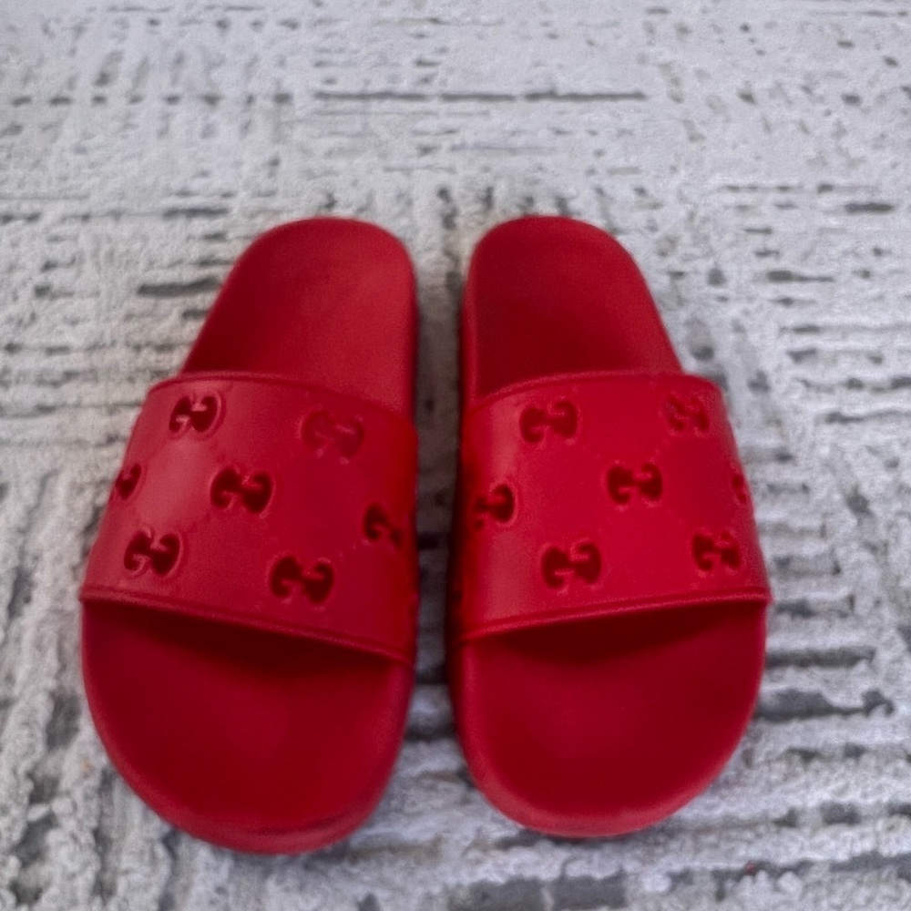 Red authentic Gucci slides